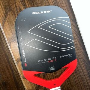Used invikta Selkirk Labs Project 007 10 MM thin Pickleball Paddle singles champ